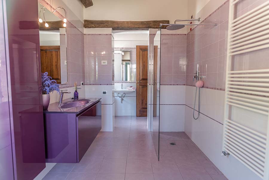 Bathroom with glass shower at Casale Vigneto