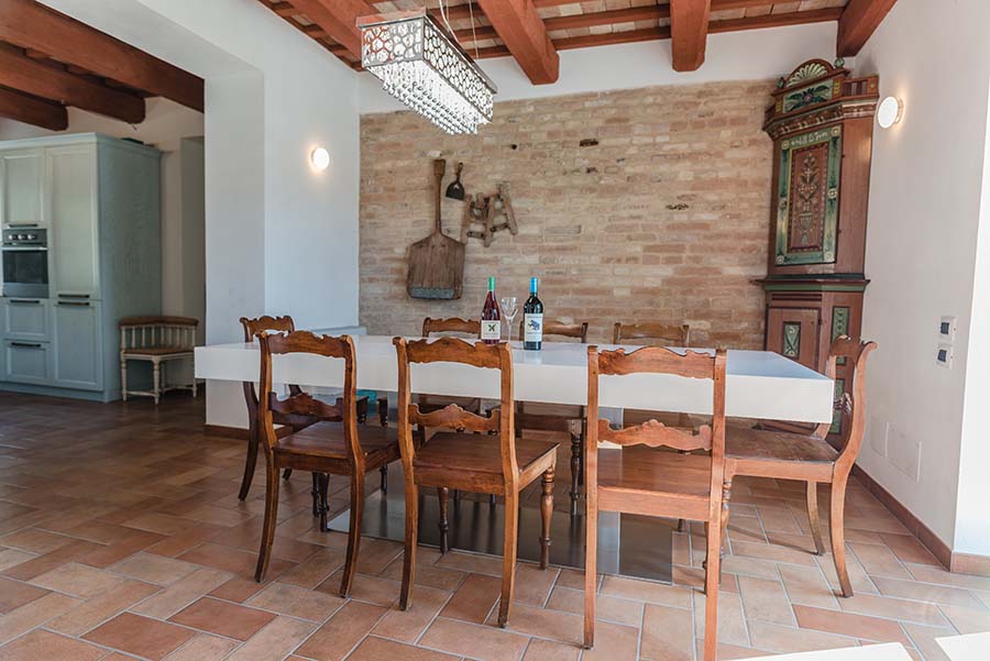 Rustic dining room inside Casale Vigneto