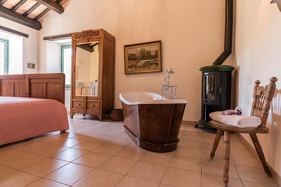 Master bedroom with freestanding bath